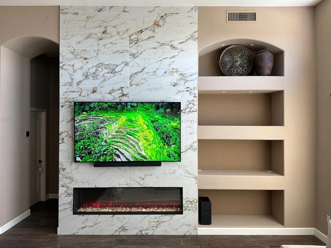 Whole-home remodel with marble fireplace and open living area in Surprise, AZ